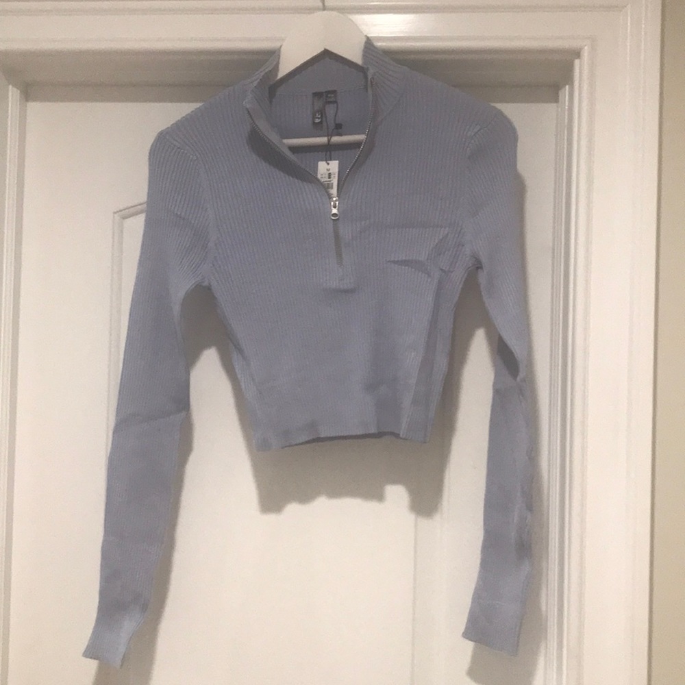 Garage 1/2 zip beautiful long sleeve sweater.  Never worn.  Tags still on.